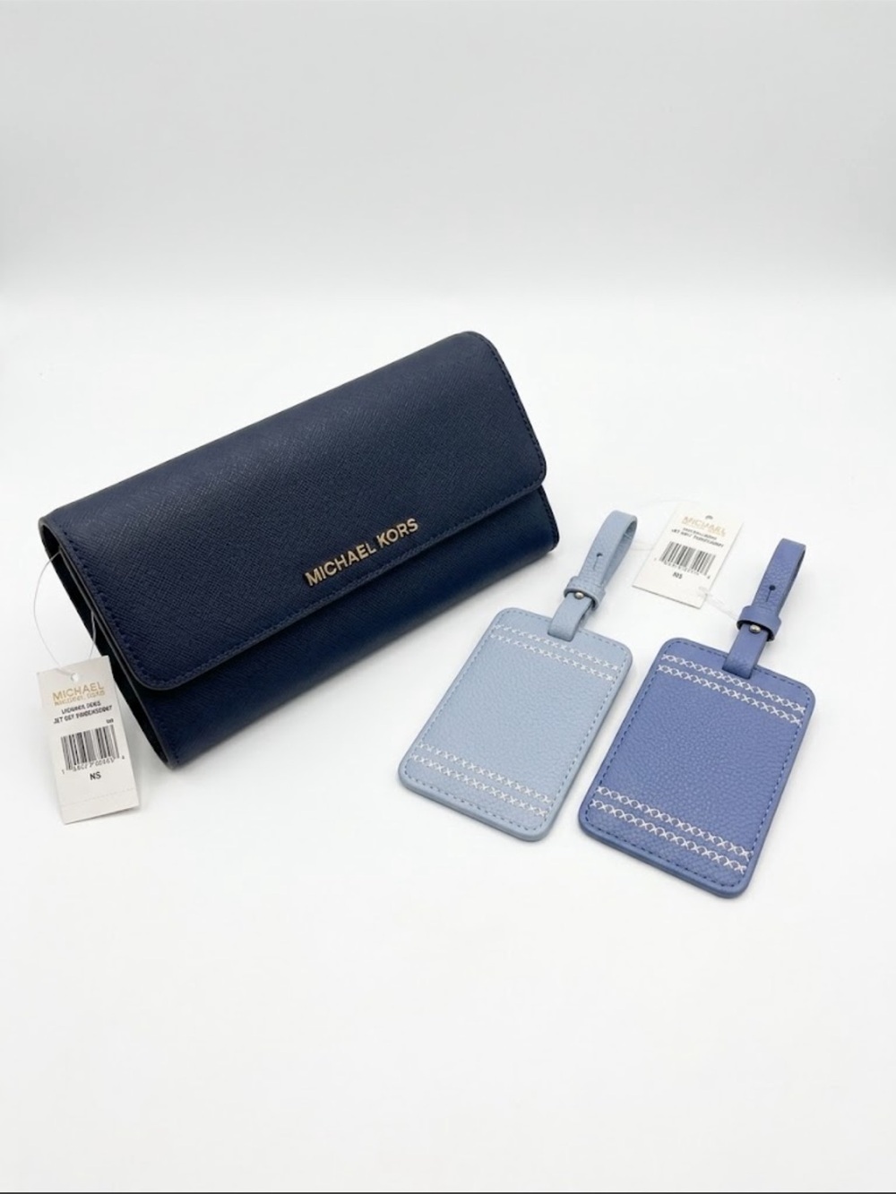 Michael kors navy nwt wallet and luggage tags nwt lots of compartments great!!!